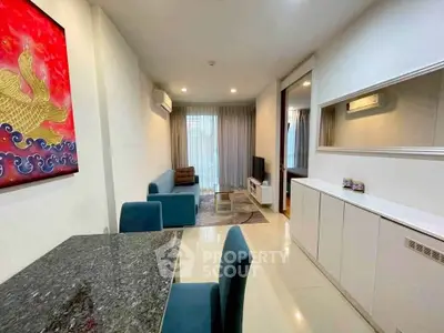 Modern living room with stylish decor and open layout in a contemporary apartment.
