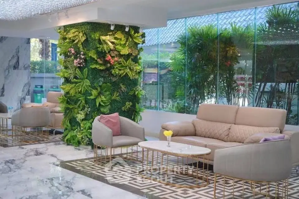Luxurious modern living room with elegant decor and lush green wall