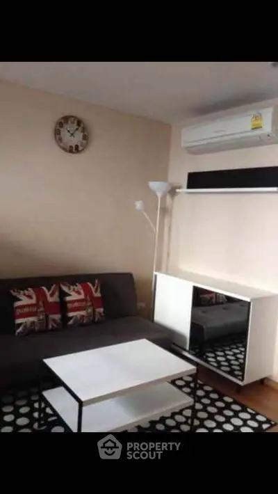 Cozy living room with modern decor and air conditioning