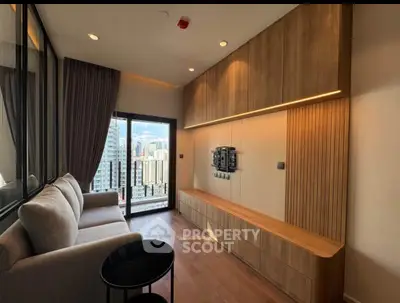 Modern living room with city view and stylish wooden cabinetry