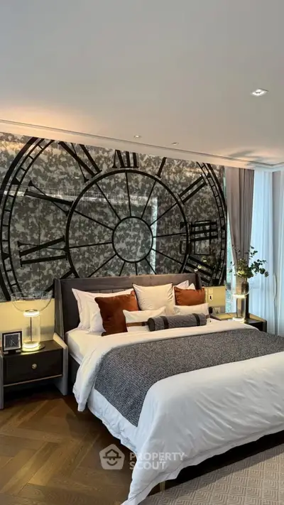 Luxurious bedroom with stylish clock-themed accent wall and elegant decor
