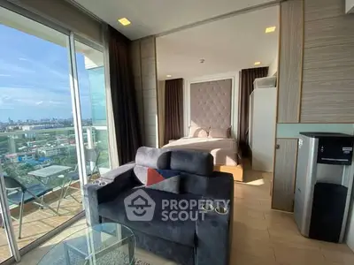 Modern studio apartment with city view and cozy interior design