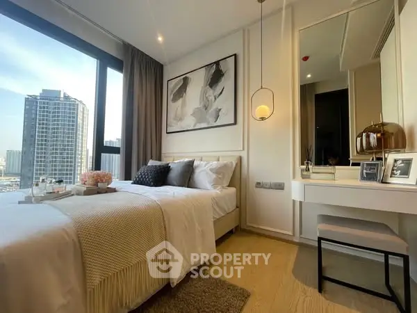 Luxurious modern bedroom with city view in high-rise apartment