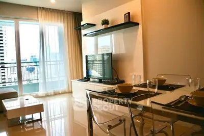 Modern living room with city view, sleek furniture, and elegant decor.