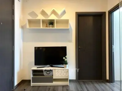 Modern living room with sleek TV stand and decorative shelving