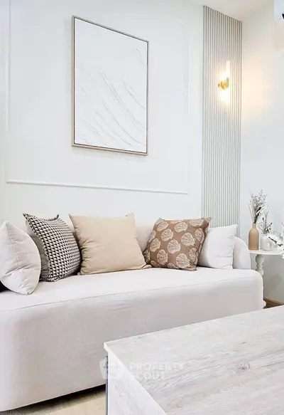 Modern living room with stylish decor and cozy sofa