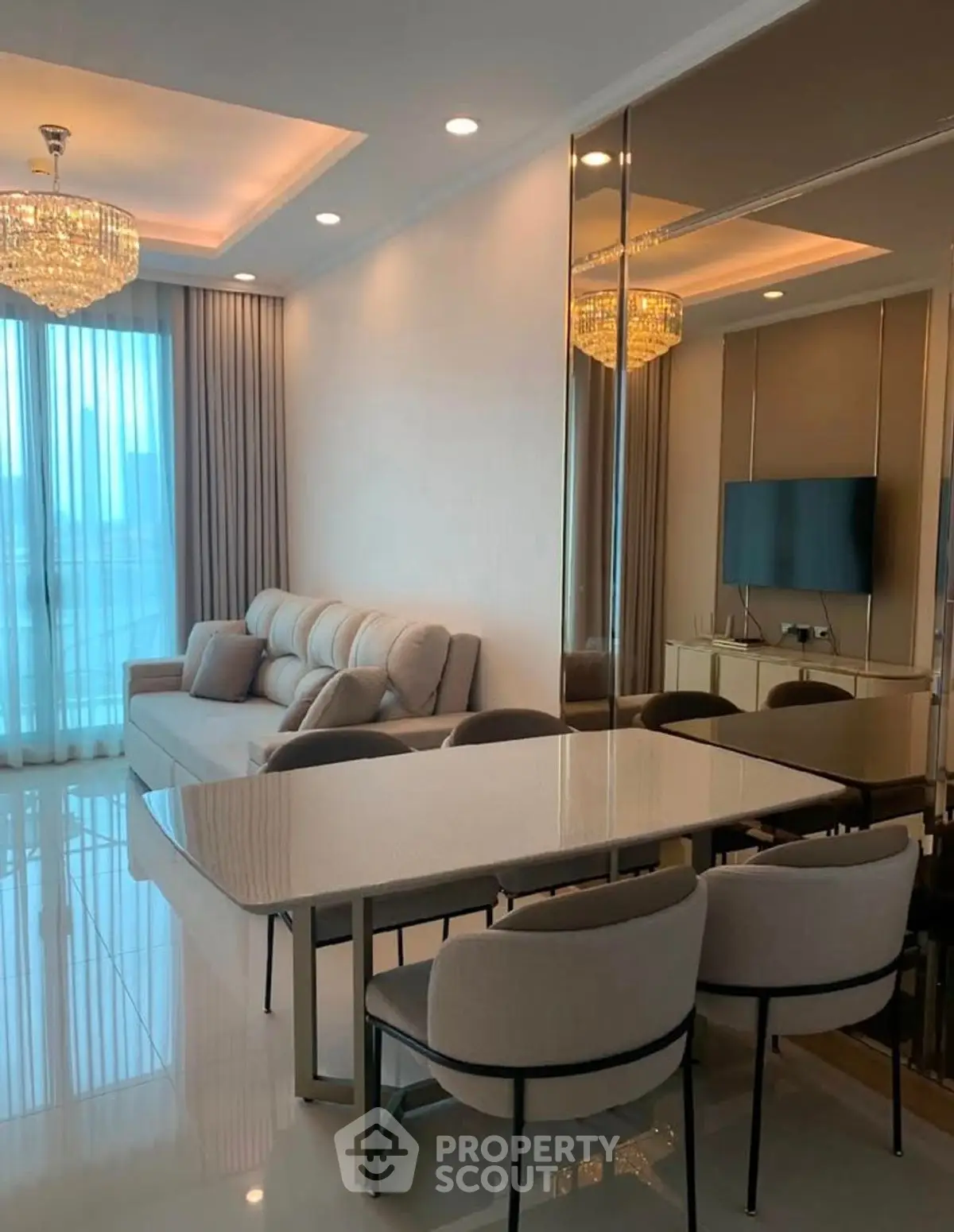 Luxurious modern living room with elegant dining area and chic lighting