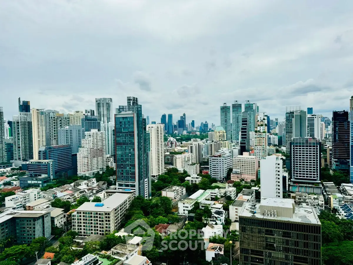 Stunning cityscape view showcasing modern high-rise buildings and lush greenery.