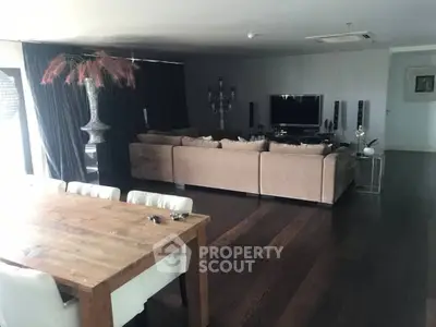 Luxurious living room with elegant decor and spacious seating area.