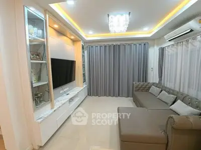 Luxurious living room with elegant lighting and modern furnishings