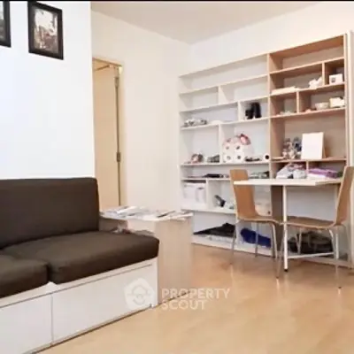 Cozy living room with modern furniture and built-in shelves