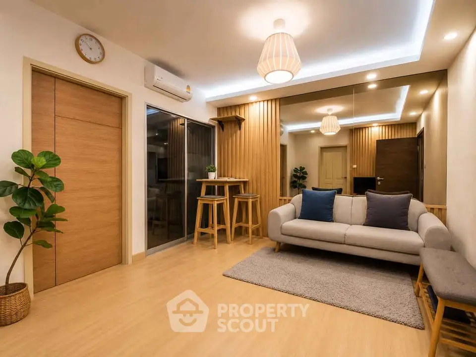 Modern living room with stylish decor and cozy seating area, perfect for relaxation and entertainment.