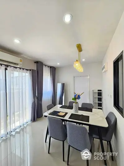 Modern dining room with elegant decor and natural light