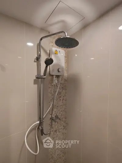Modern bathroom with sleek showerhead and water heater
