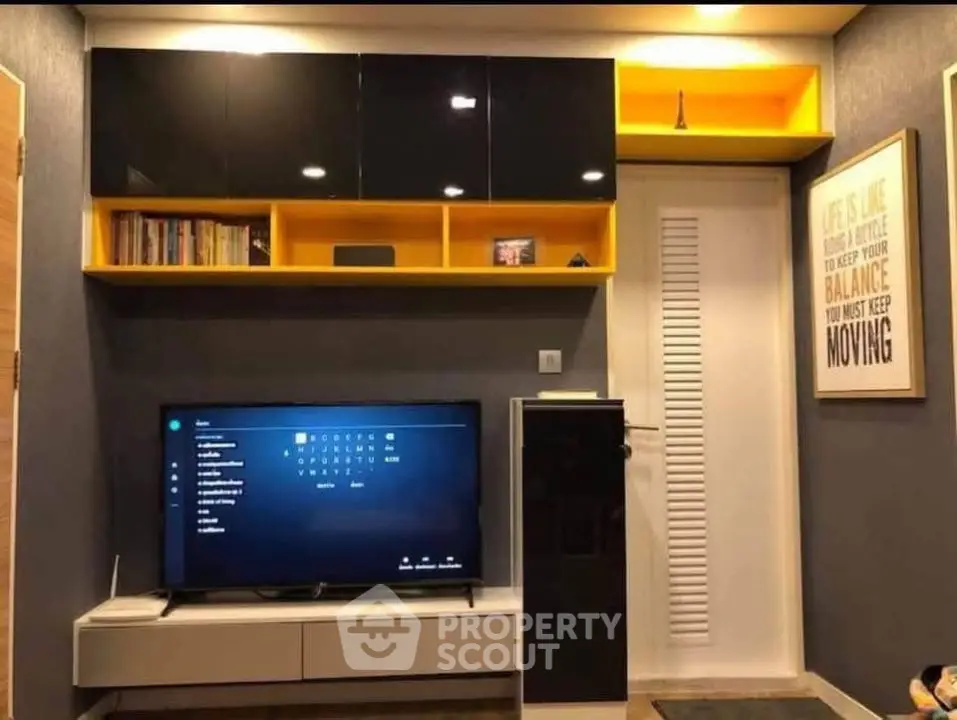 Modern living room with sleek TV unit and stylish shelving