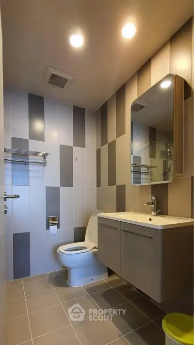 Modern bathroom with sleek fixtures and stylish tile design