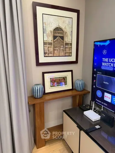 Stylish living room corner with modern decor and entertainment setup