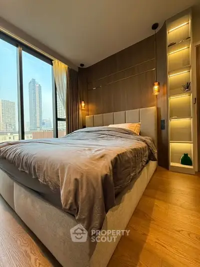 Luxurious bedroom with city view and elegant lighting in modern apartment