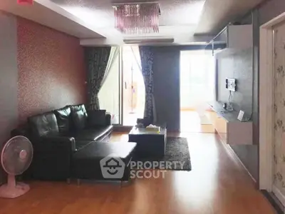 Spacious living room with modern decor and natural light