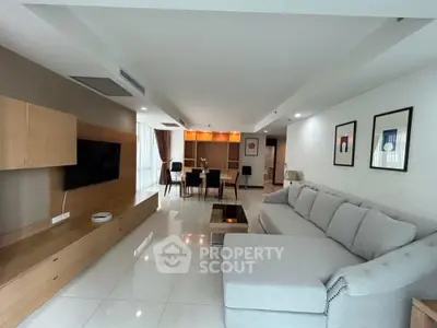 Spacious modern living room with elegant decor and large sectional sofa