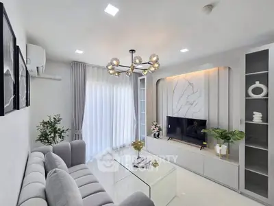 Modern living room with elegant decor and stylish lighting
