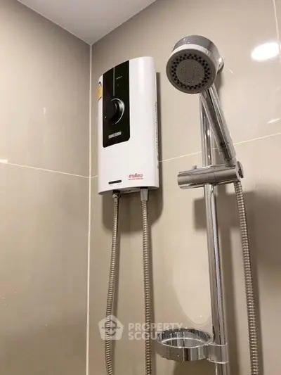 Modern bathroom shower with sleek water heater and chrome fixtures