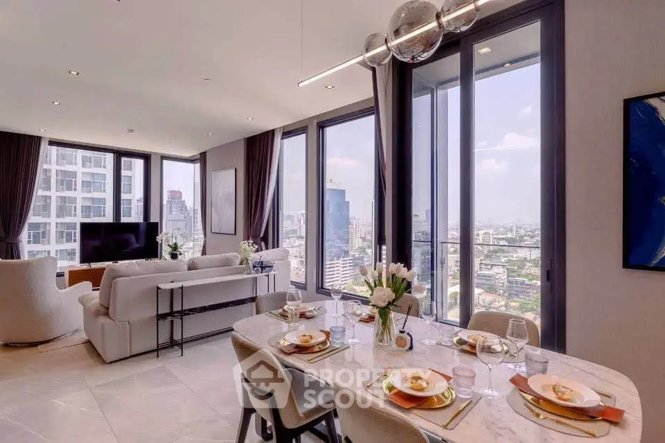 Luxurious open-plan living room with stunning city views and elegant dining area.