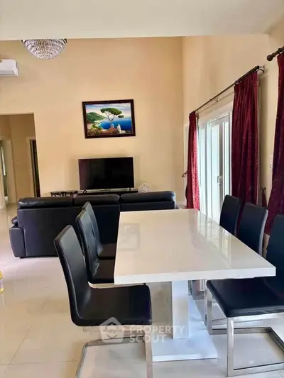 Spacious modern living room with elegant dining area and stylish decor