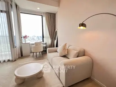 Elegant living room with city view, modern furniture, and natural light.