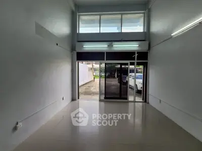 Spacious commercial space with large windows and ample natural light