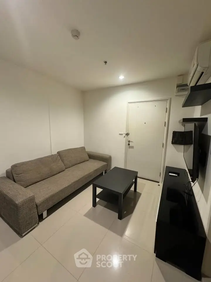 Modern living room with sleek furniture and minimalist design
