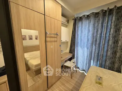 Cozy bedroom with wooden furniture and natural light