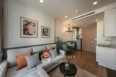 Stylish modern living room with elegant decor and cozy seating in a chic apartment.