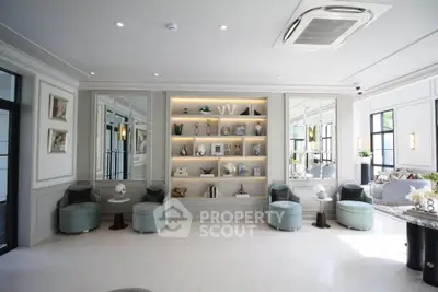 Luxurious modern living room with elegant decor and ample natural light