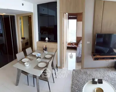 Modern open-plan living and dining area with stylish decor and natural light