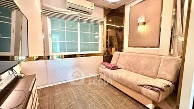 Cozy living room with modern decor and comfortable sofa