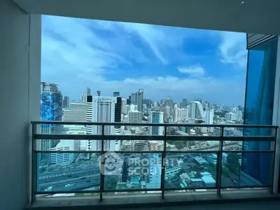 Stunning cityscape view from a high-rise balcony, perfect for urban living enthusiasts.