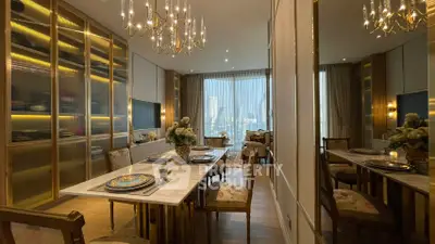 Luxurious dining and living area with elegant chandeliers and city view.