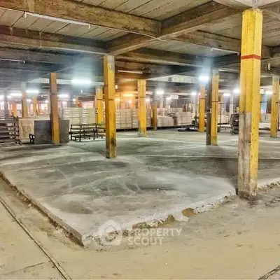 Spacious industrial warehouse with high ceilings and ample storage space