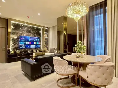 Luxurious modern living room with elegant chandelier and stylish decor