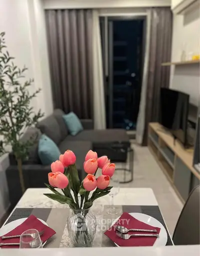 Chic modern living room with cozy seating and elegant dining setup, perfect for urban living.