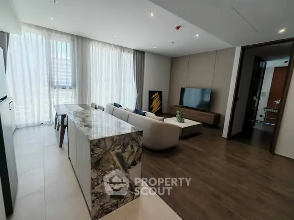 Spacious modern living room with elegant decor and natural light