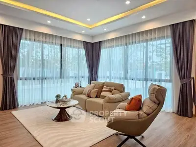 Luxurious corner living room with elegant curtains and cozy seating