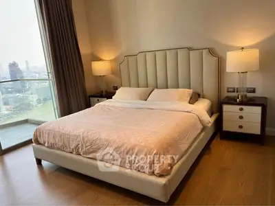 Luxurious bedroom with city view and elegant decor