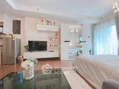 Modern studio apartment with cozy living area and stylish decor