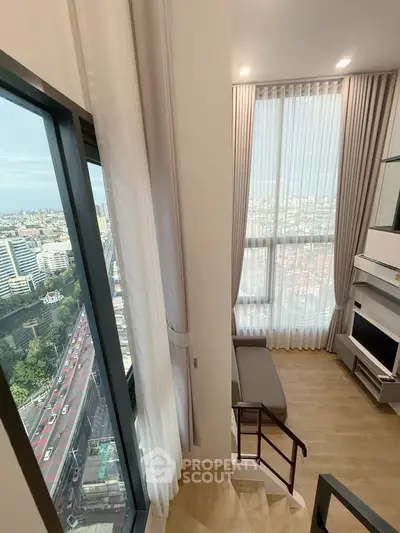 Modern high-rise apartment with stunning city view and elegant interior design.