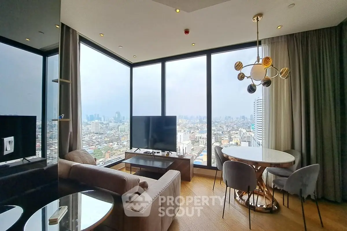 Luxurious high-rise living room with panoramic city views and modern decor