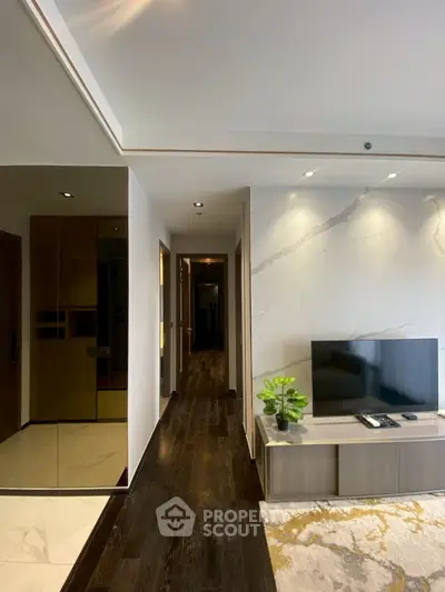 Modern living room with sleek TV unit and elegant decor