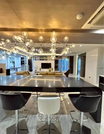 Luxurious modern living room with stylish lighting and open layout