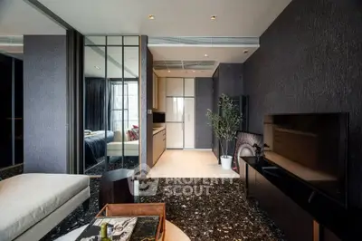 Luxurious modern living room with sleek design and elegant decor, featuring a spacious layout and stylish furnishings.